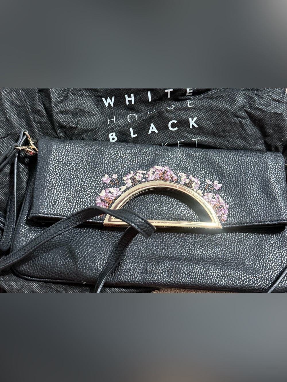 Black Embroidered Leather Handbag with Gold Accent